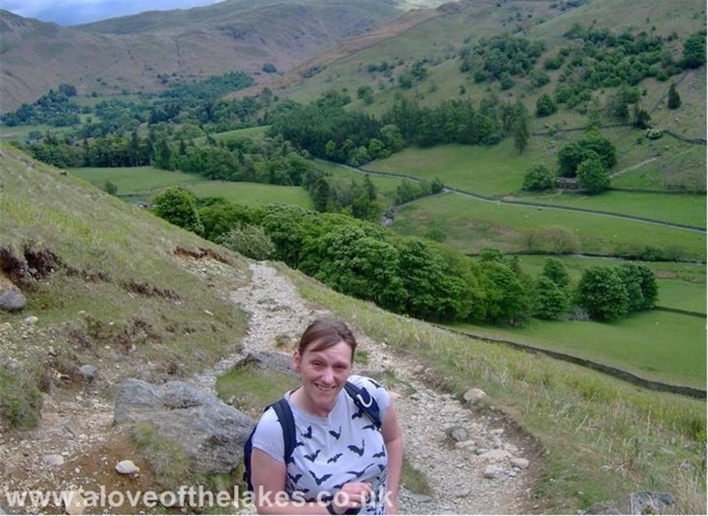 A love of the Lakes - Along the path now and Sue pauses for a breather