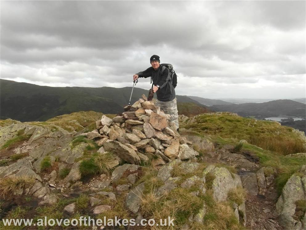 A love of the Lakes - Me doing a bit of cairn maintenance on the summit of Gibson Knott