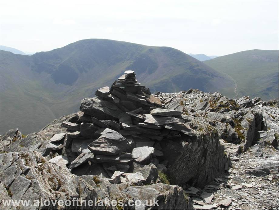 A love of the Lakes - The summit cairn on Grisedale Pike