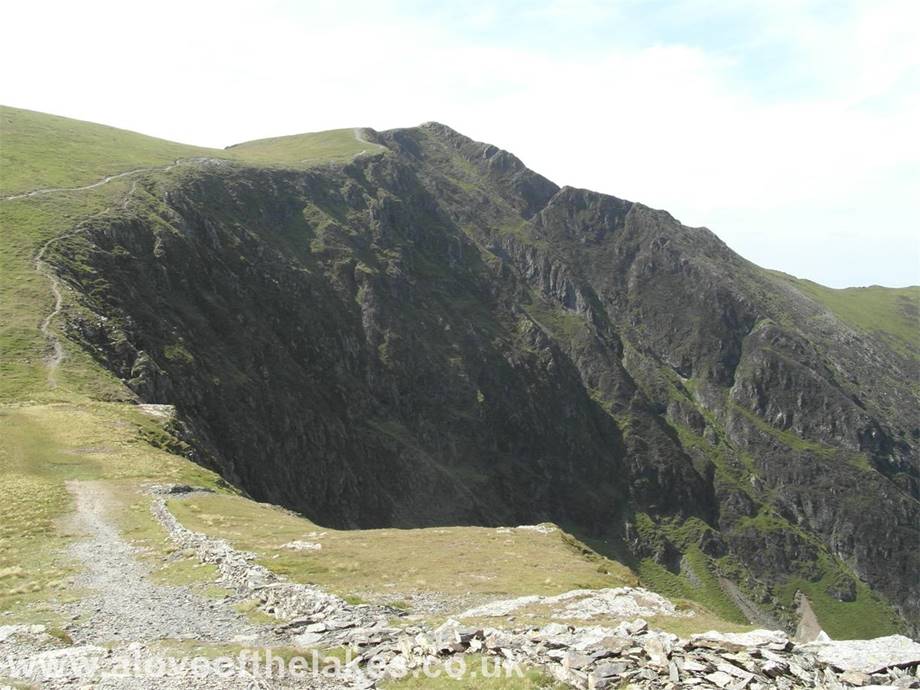 A love of the Lakes - The path skirts very close to the imposing Hobcarton Crags