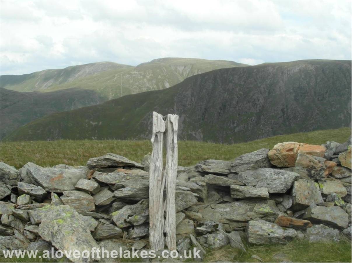 The wooden stake represents the actual summit of Hartsop Dodd