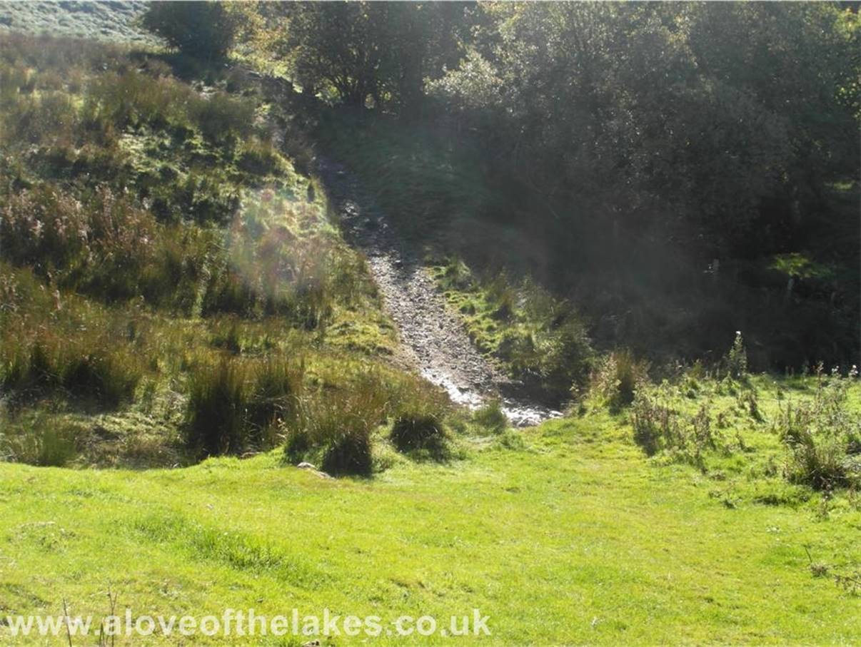 From the gate, turn right and head off down a footpath that runs parallel with Longlands Beck