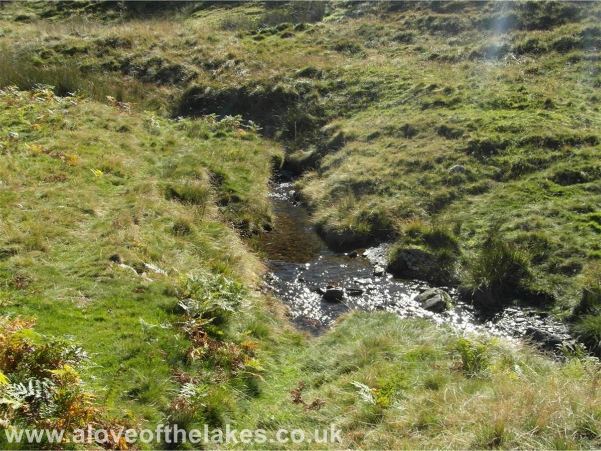 Follow the path and cross over the River Ellen and head for the small series of hillocks that guide you to the pass of Trusmadoor