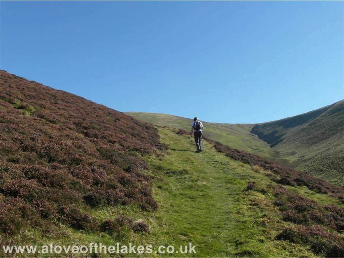 On arrival at the top of the pass, on your left you will see a narrow track that climbs steeply and directly to the summit of Meal Fell, 
but this can be avoided for the more gentle option of staying on the main path as it bends round the northern face of the fell
