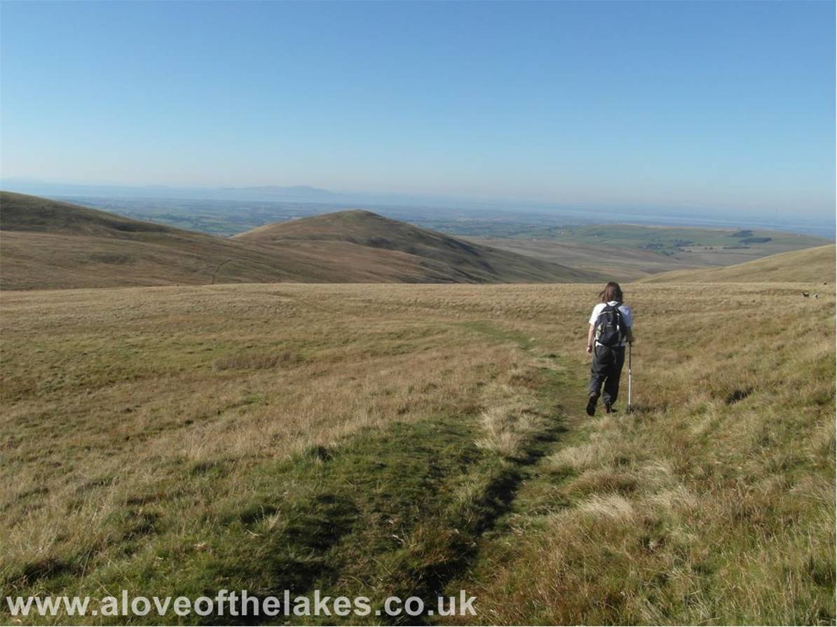 We head off down the bridal way towards Longlands Fell. It runs alongside Lowthwaite Fell and crosses the top of Charleton Gill