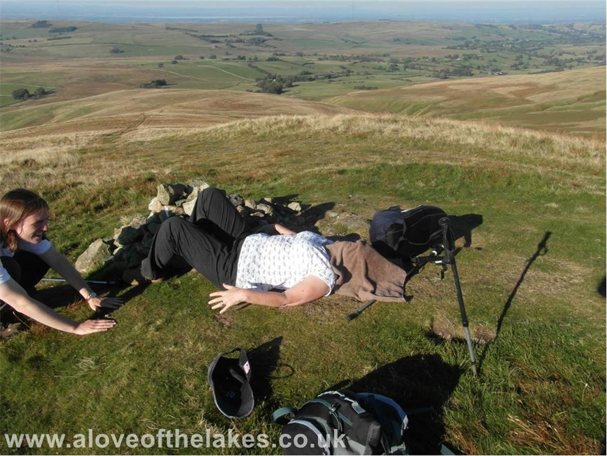 On the summit of Longlands Fell and all this heat is getting to Sue !! 