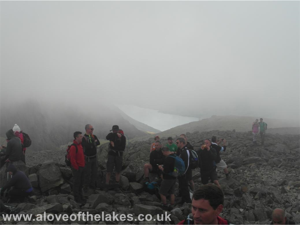 The summit was heaving as usual as the mist closes in and hides all the views