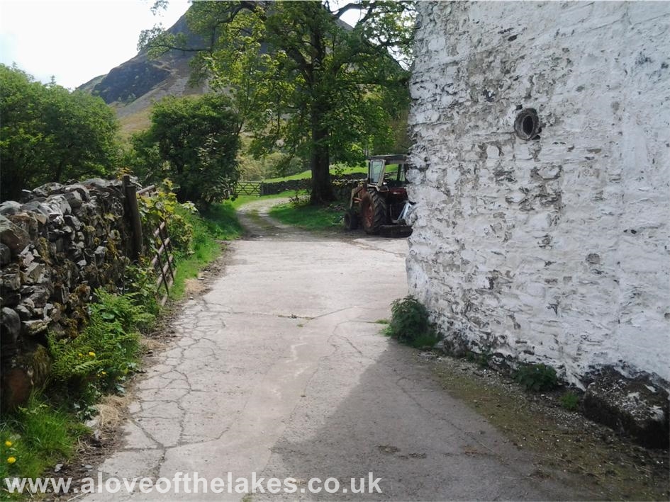 Through the farmyard and head for the path leading towards Mosedale