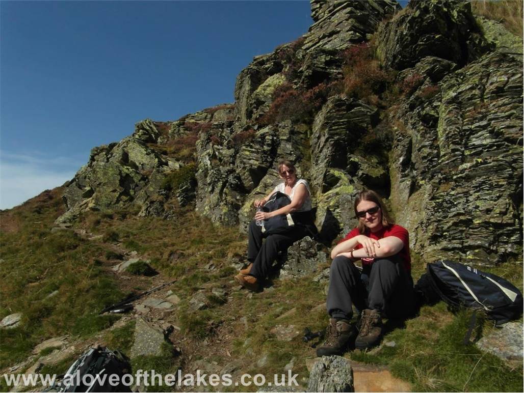 A quick rest and drinks break at the rock outcrop