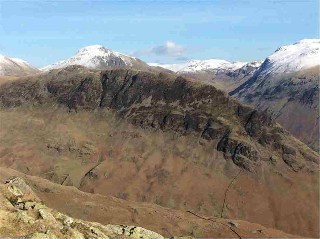 A close up of nearby Yewbarrow with Great Gable in the background