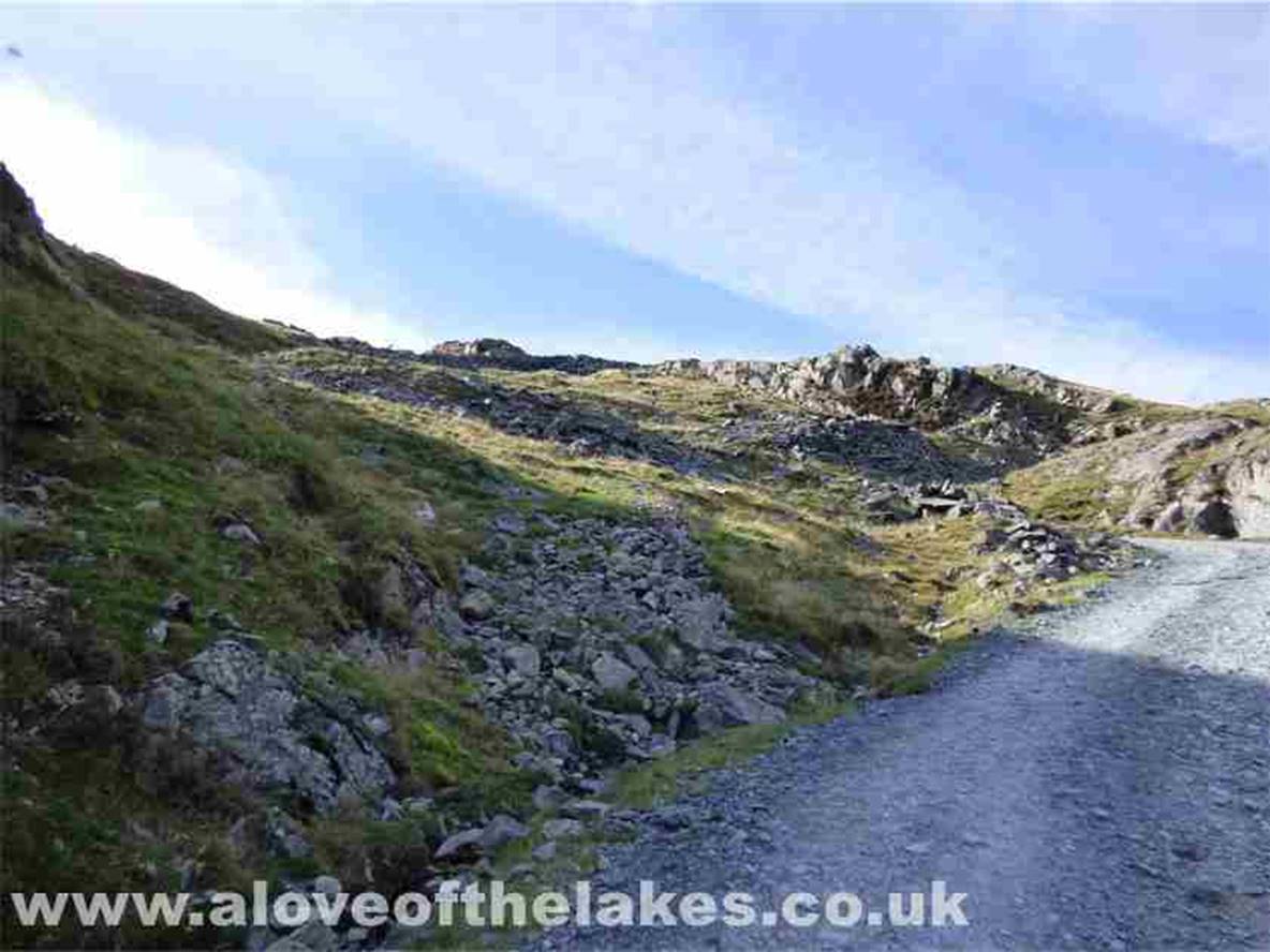 Meanwhile our sedate route up takes a few twists and turns, but keeps on the wide shale path
