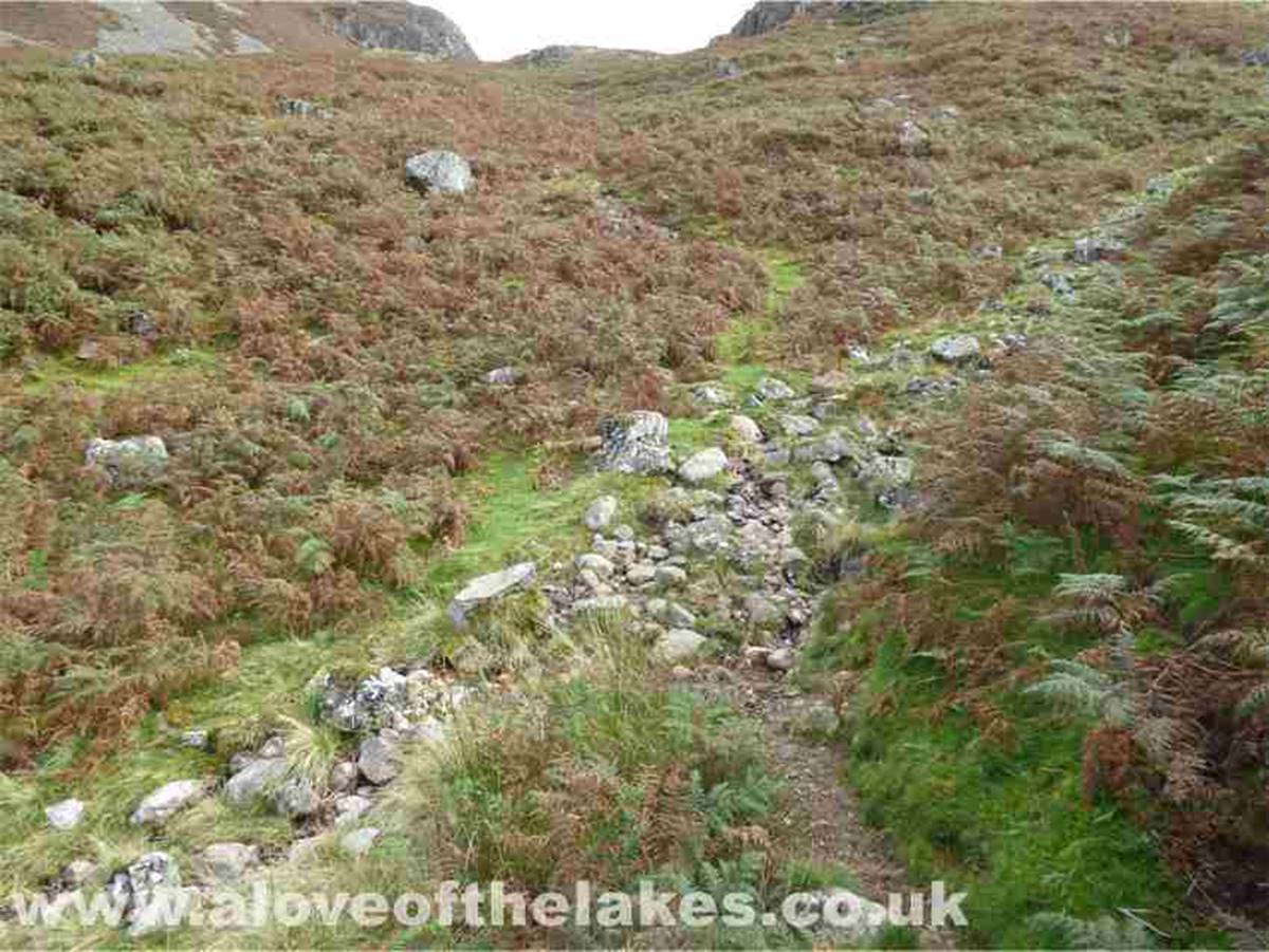 Crossing a minor tributary of Rake Beck, the path becomes clearer as it heads towards the Col