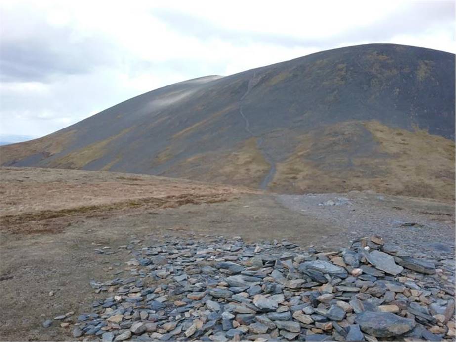 An ingenious, but scary path up to the summit of Skiddaw, a fairly hard core route in this wind
