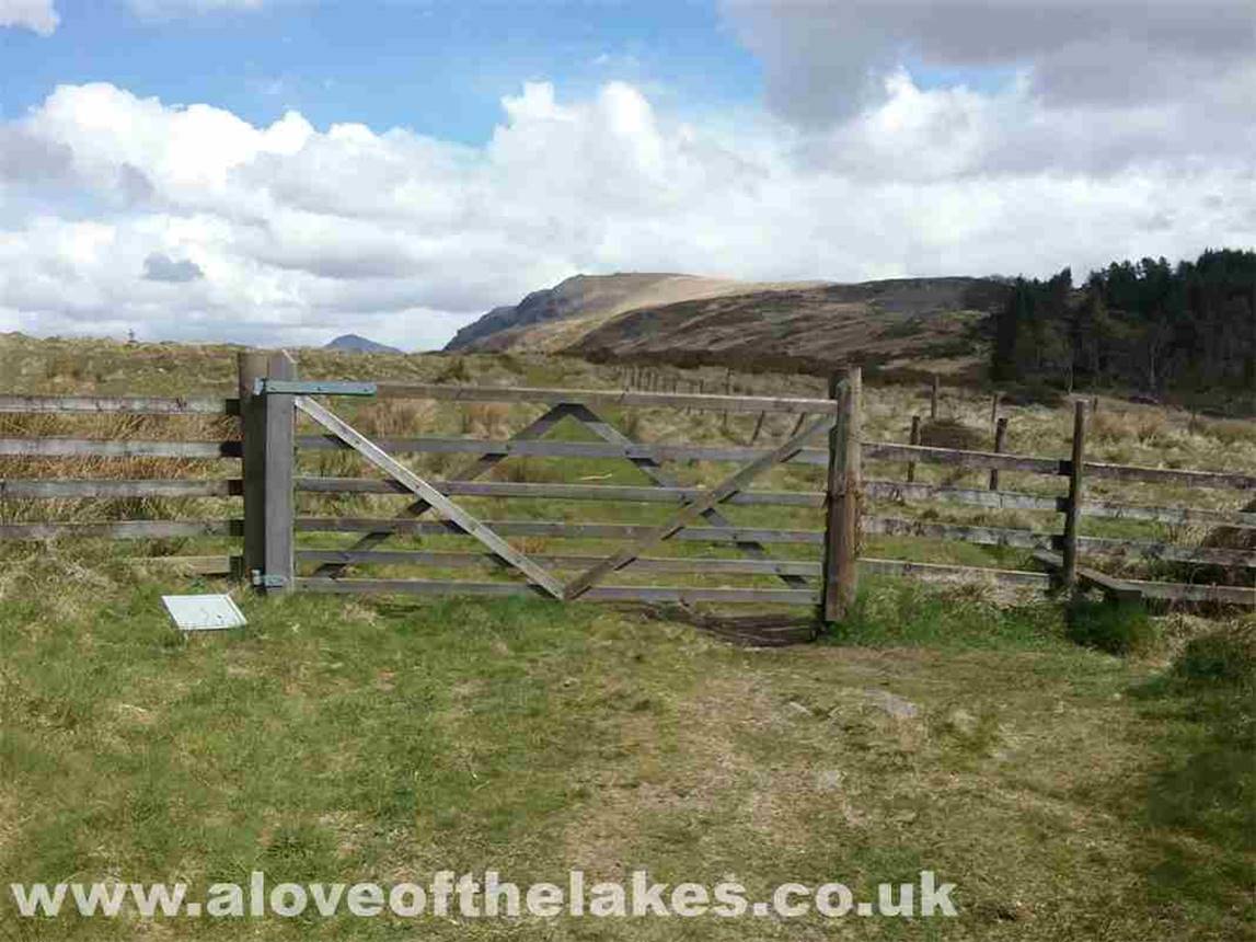 Eventually a gate is reached that gives access to the open fell and the first objective on the route  Irton Fell

