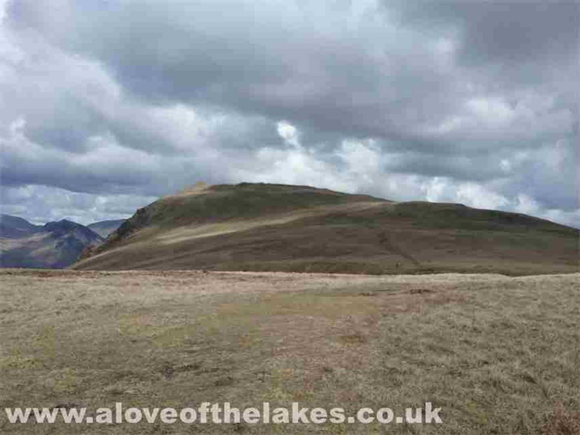At the summit of Irton Pike and a clear view of the path leading to Whin Rigg summit