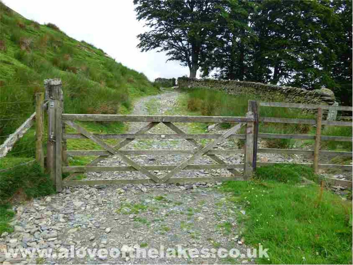 Through the gate to gain access to the open fell side