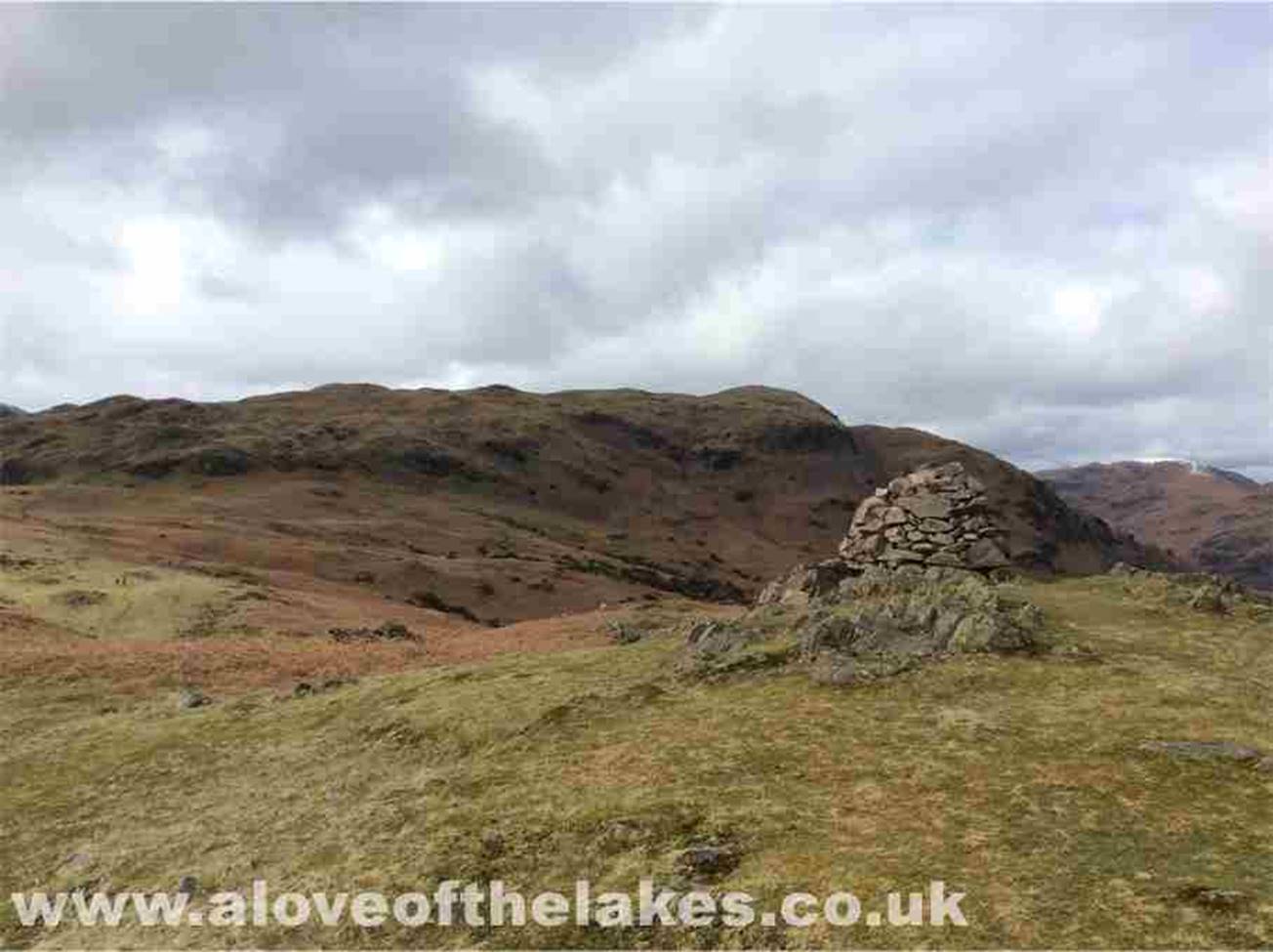 From the front marker cairn, the summit of Silver Howe is seen for the firsts time (The high point of the ridge line)