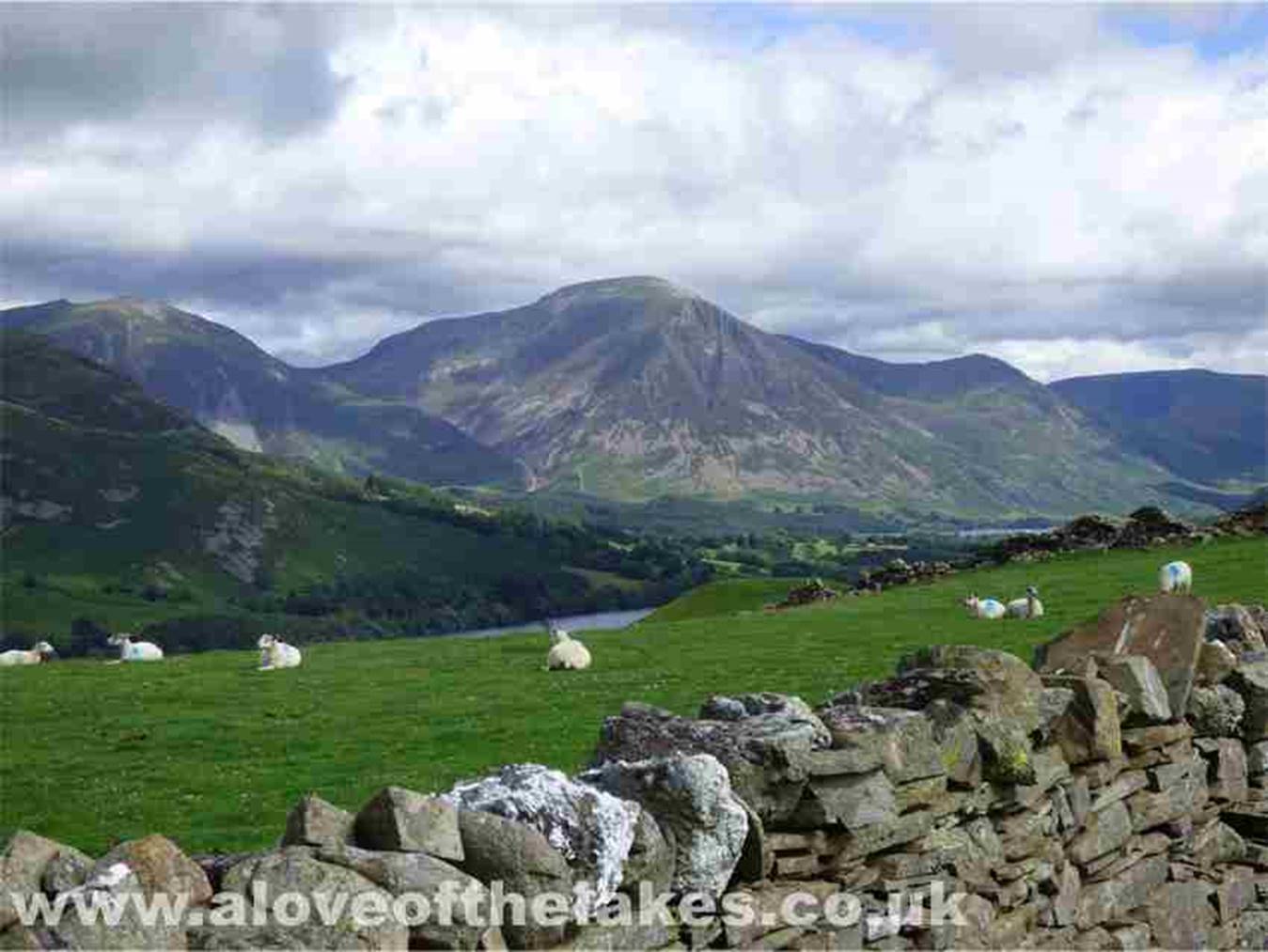 An early view across Crummock water of Whiteside and Grasmoor