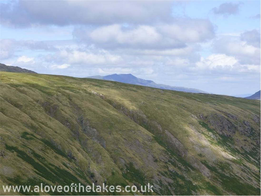 Looking behind towards Blencathra over the Dale Head / Scawdell range