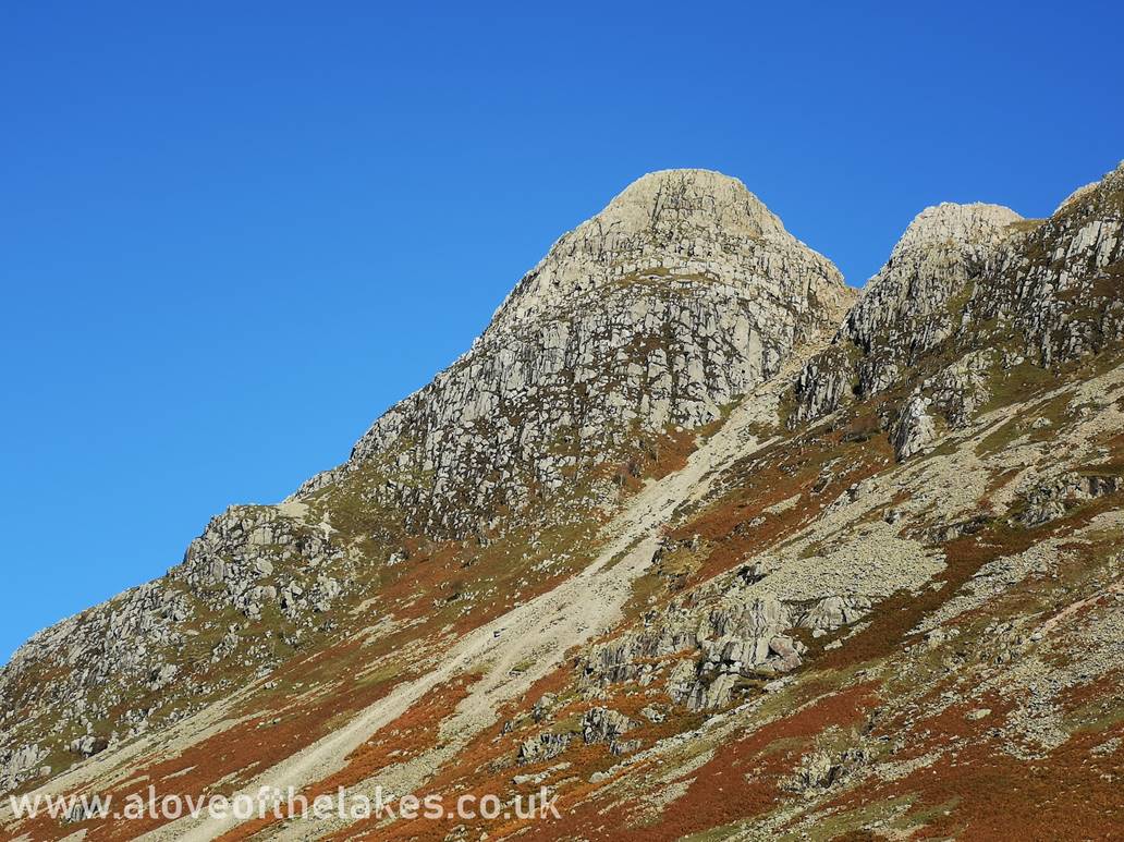 A close up of the imposing southern face of Pike o Stickle
