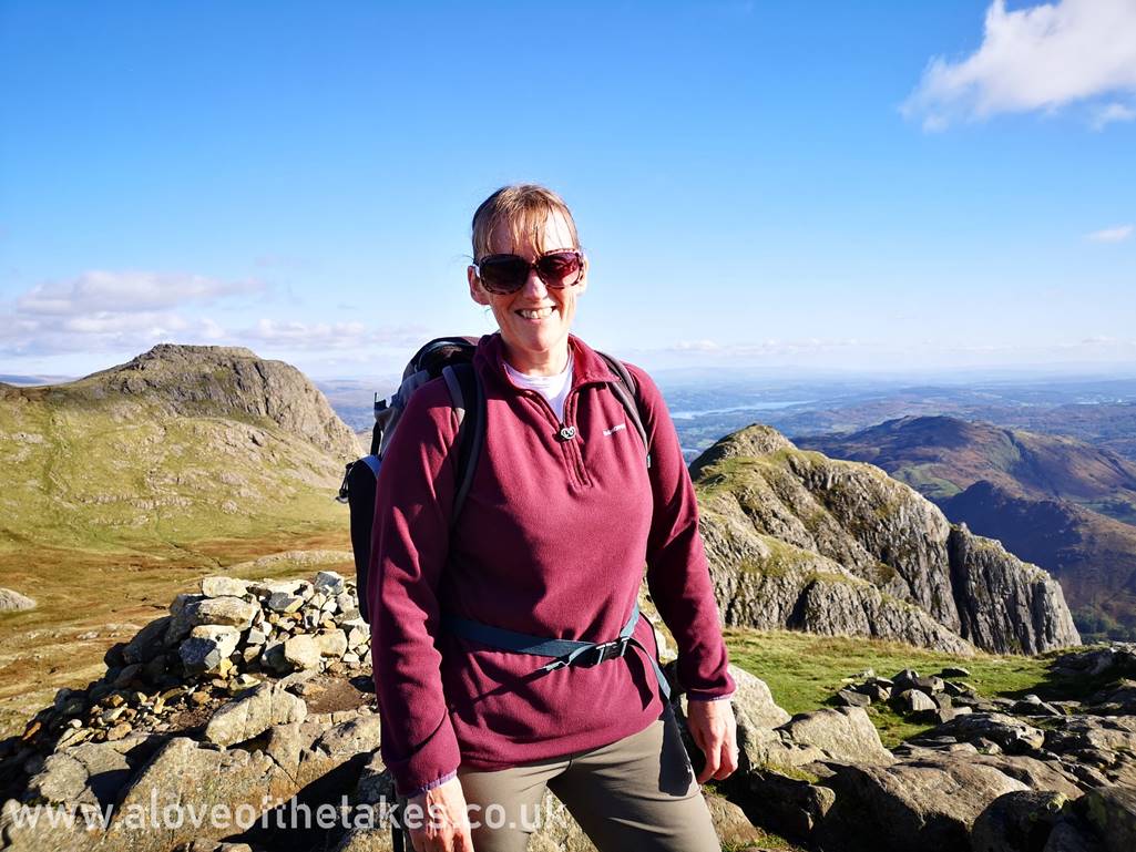 Sue on the summit of Pike o Stickle. Our second fell of the day (Loft Crag) can be seen to the right and our
third fell (Harrison Stickle) to the left
