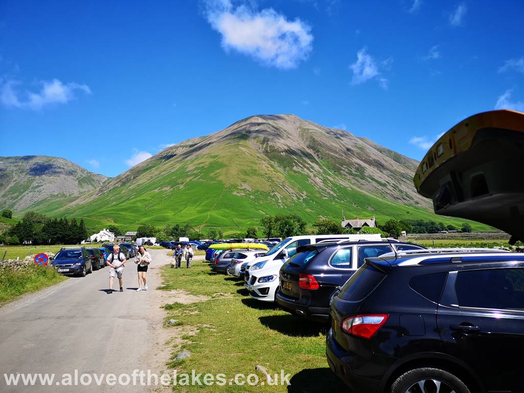 The free car parking just before you reach the Inn at Wasdale Head is the starting point for this walk. Its very 
busy  especially in weather like this, so you are will not always be guaranteed a space, however road side 
parking in various wider spots of the approach road can be used. Kirk Fell and the direct path up its nose can 
clearly be seen and from this angle looks nothing too strenuous. Wait until you get closer before deciding to
opt for this route!!
