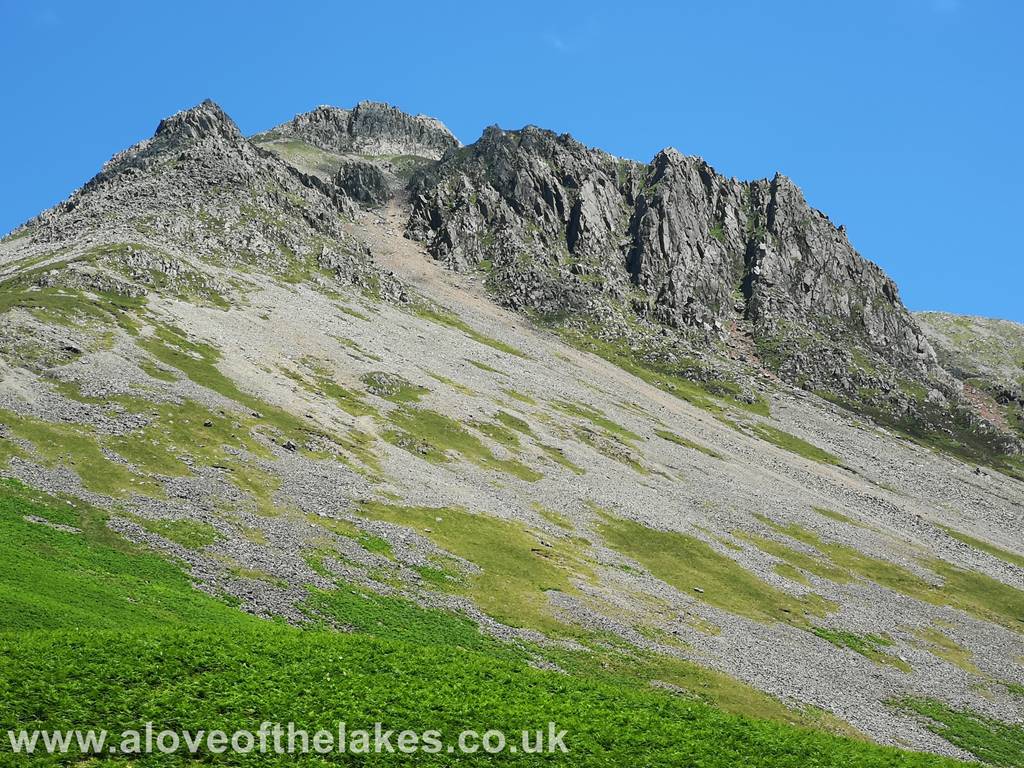 The path up to Beck Head skirts the base of the White Napes on Great Gable