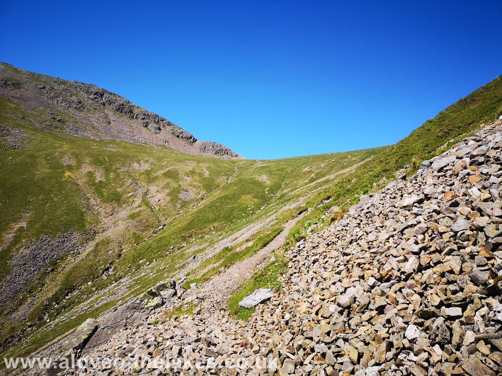 We now reach the scree section of the climb. Its steep and by and large non too slippy, there are the odd areas where a little care is needed
but nothing too onerous
