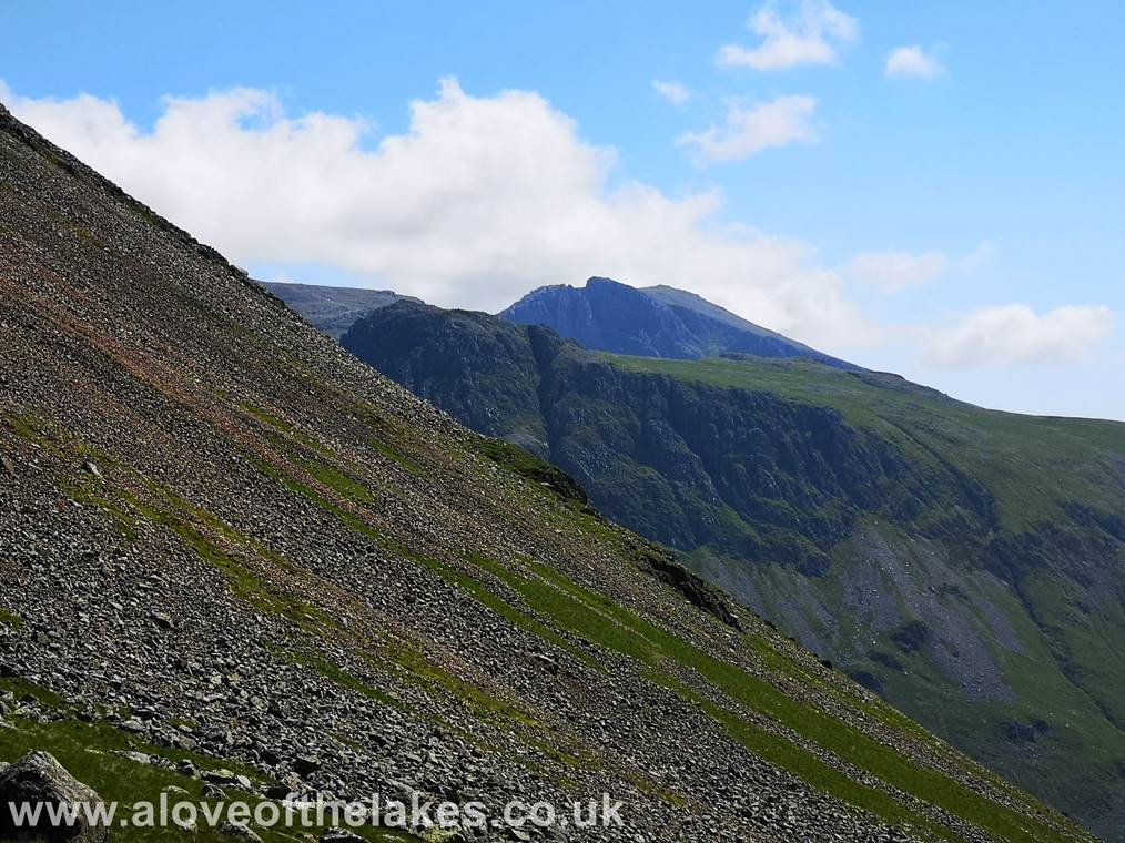 Looking over the steep Southern flank of Great Gable across to Scafell and Lingmell