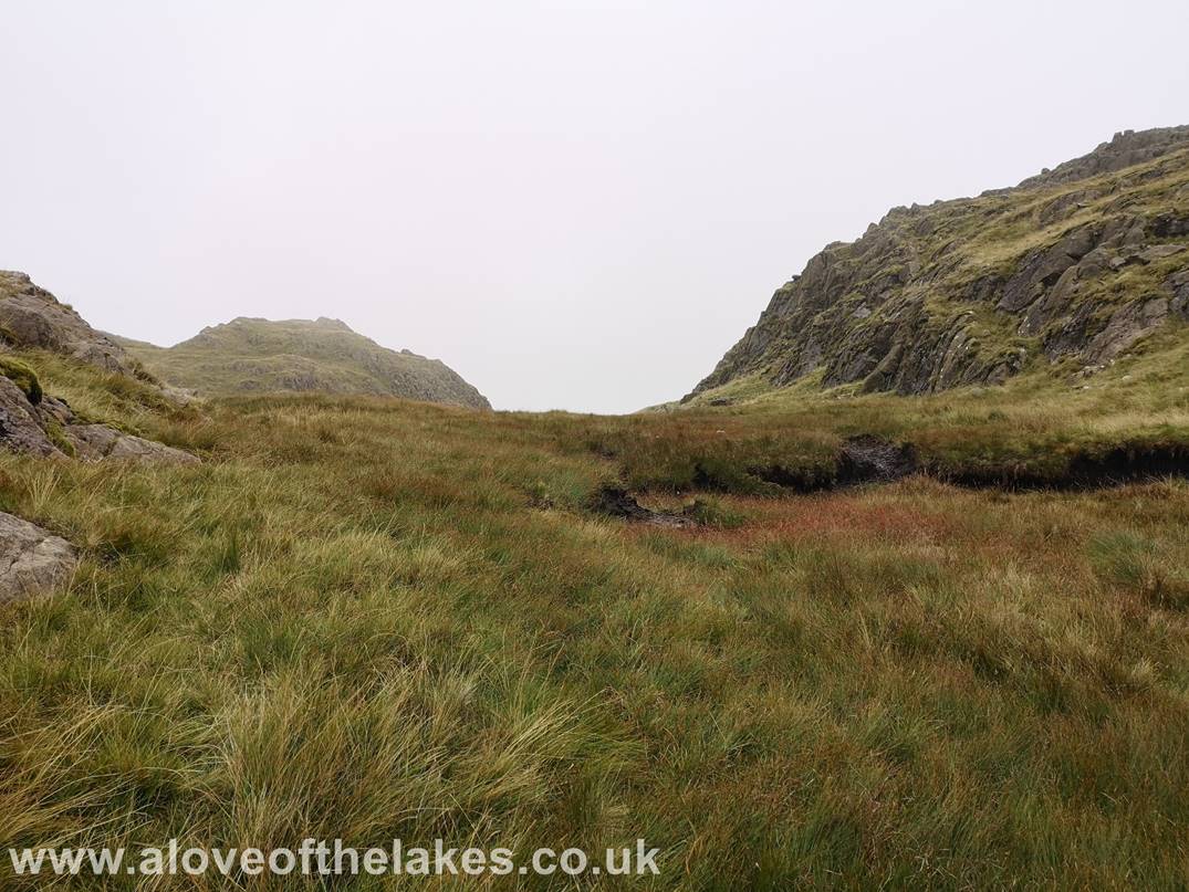 A love of the Lakes - Approaching the Col after a fairly steep climb and Hard Knott comes into view