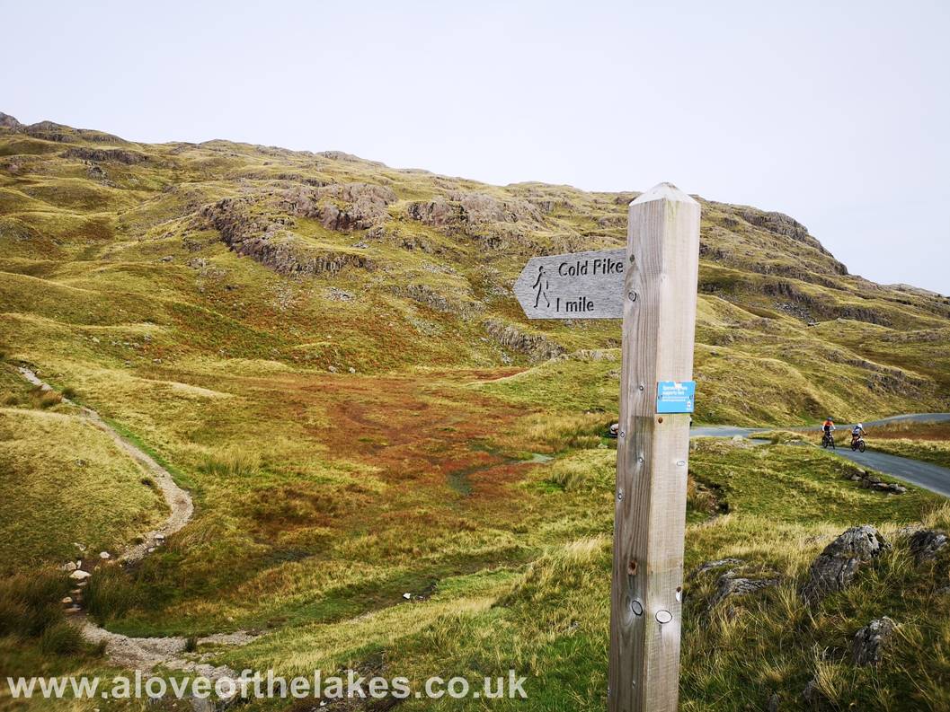 From the Wrynose Pass look out for a wooden sign post that indicates the start of the path