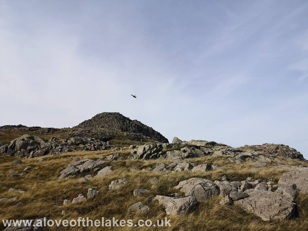 As we descended the Air Ambulance helicopter flew over and made a dramatic bee line towards the Langdale Pikes