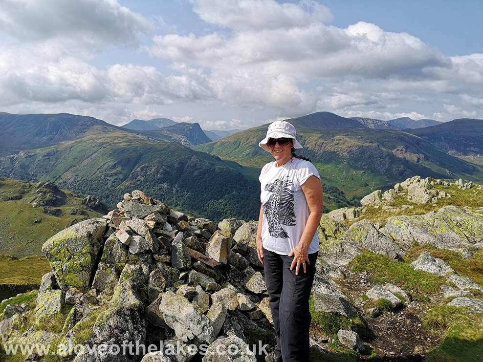 A love of the Lakes - Sue on the summit of Rosthwaite Fell