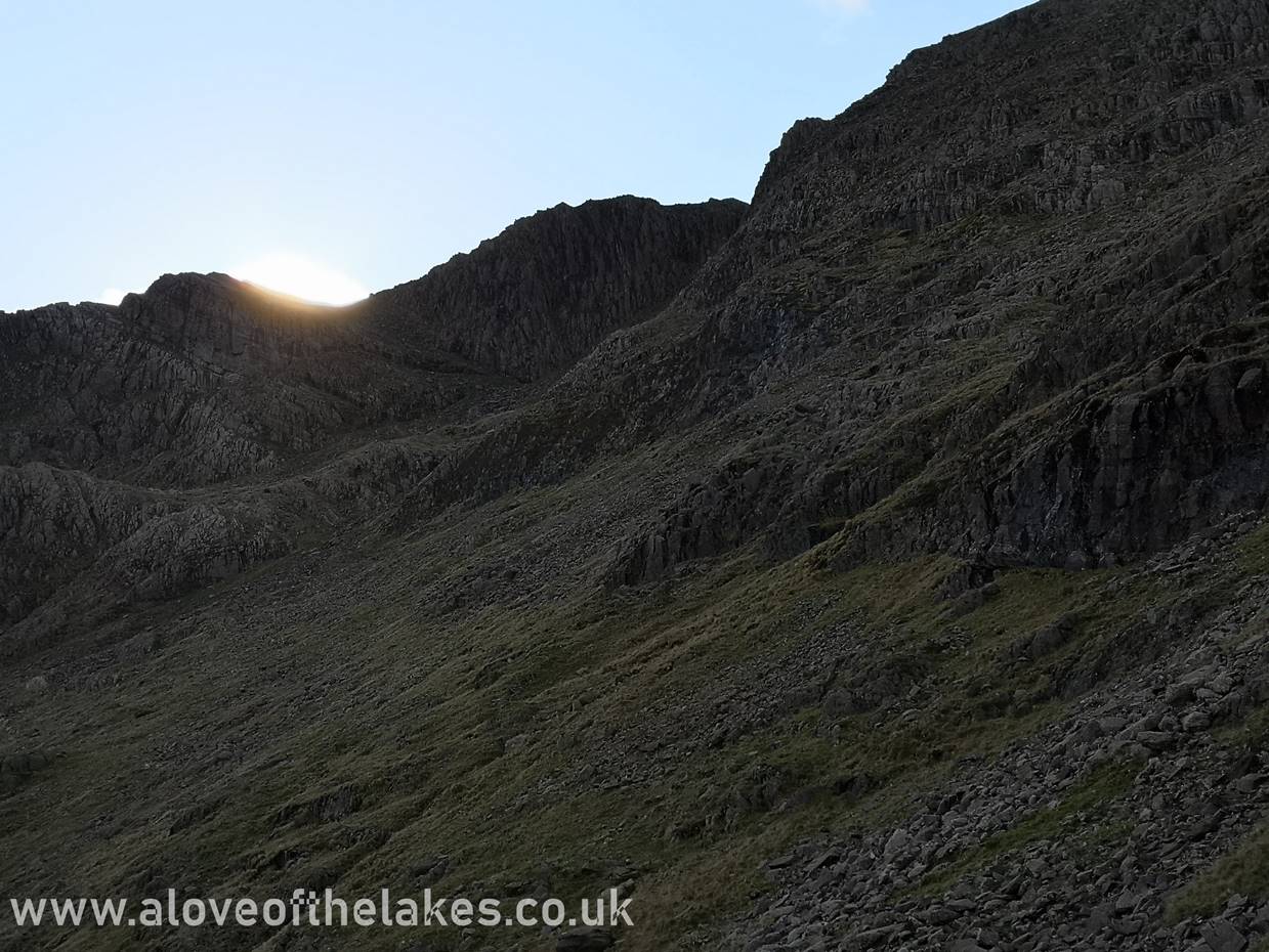Looking up to Cambridge Crag and Bowfell Buttress from the path