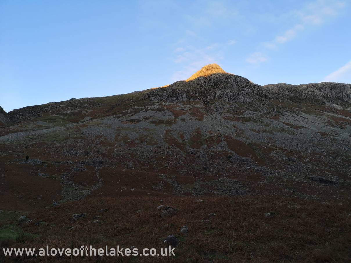 Back down on the Mickleden path now and the last glimpse of sunlight bedecks the top of Pike o’ Stickle