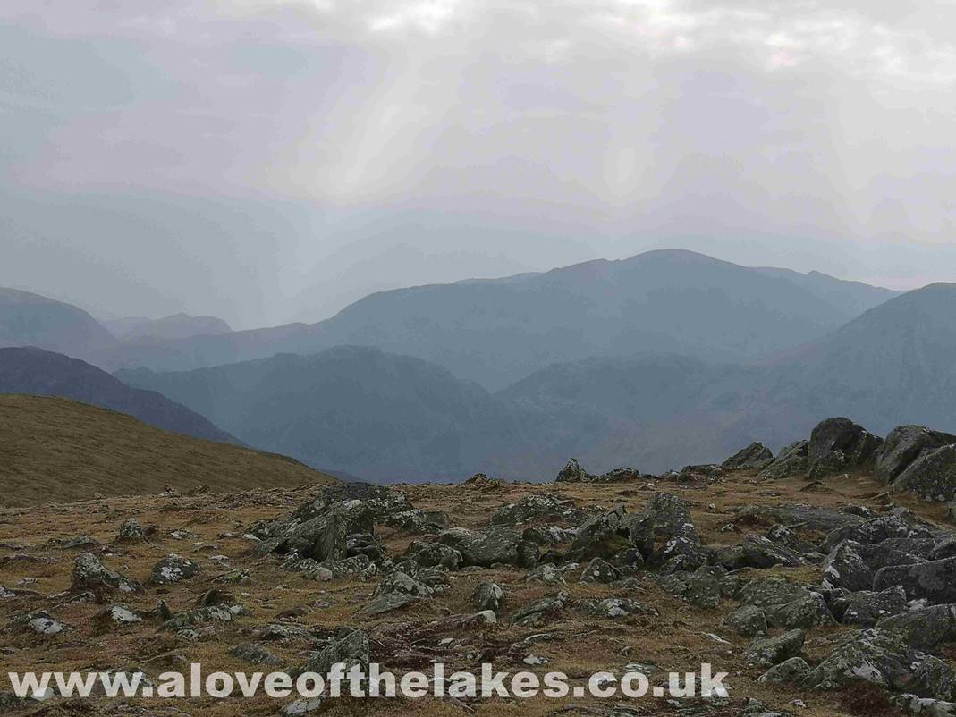 As we make our way back to Robinson for the final decent a view across to Haystacks and High Crag with Pillar
in the background
