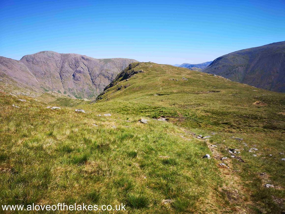 We set off from the South top towards the North top to pick up the side path off Yewbarrow (thus avoiding Stirrup Crag), 