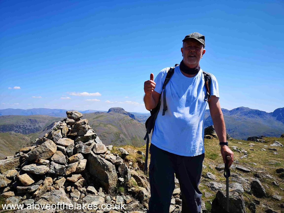 Me on the summit of Red Pike. The summit cairn is right on the edge of a steep precipice, so be careful to exit the fell on the left hand side !!!