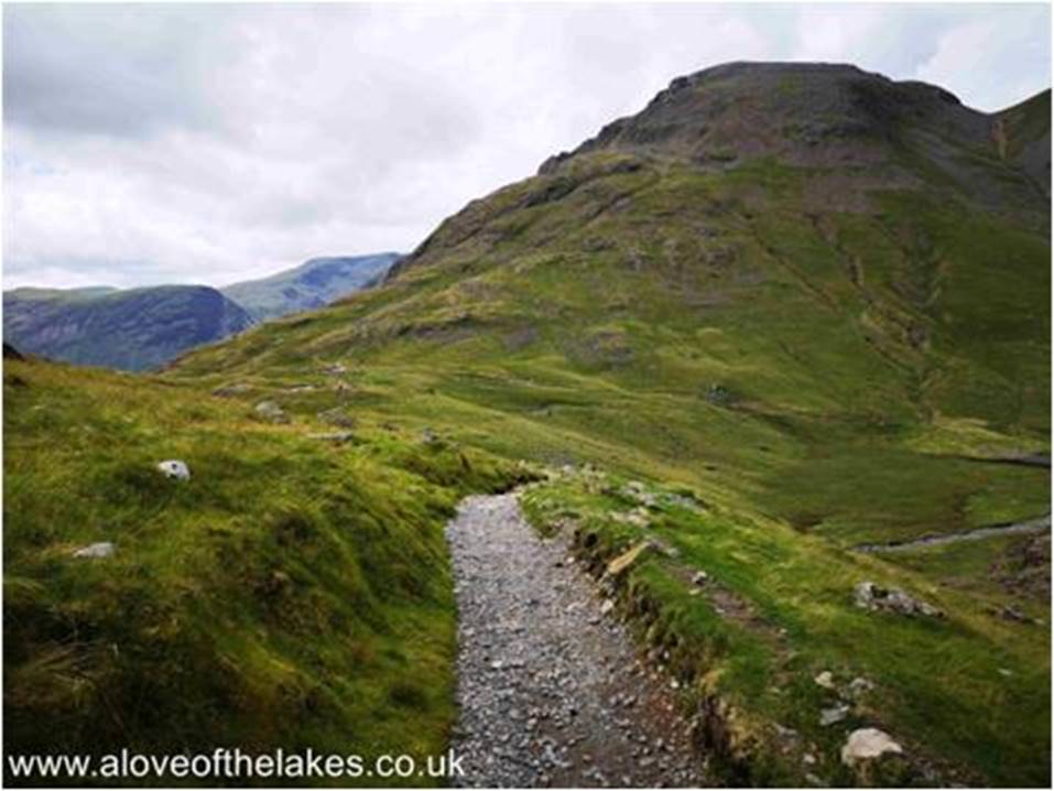 Carry along the track past the Tarn and follow it down to the Stretcher Box at Styhead