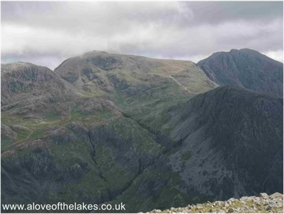 The massive gorge of Piers Gill that runs up to Lingmell Col and the start of the Tourist path up to Scafell Pike (slightly shrouded in cloud)