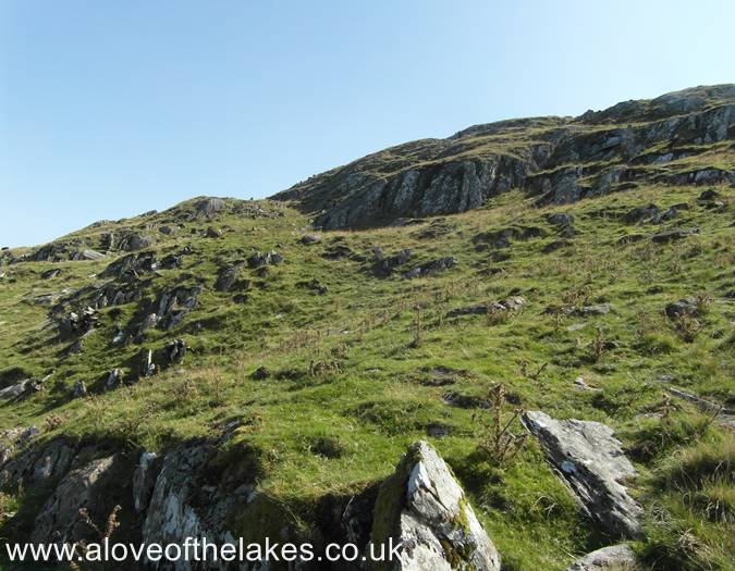 The path weaves its way round a boulder field