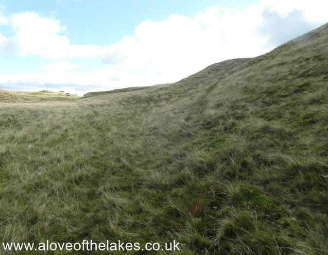 The grass trod leading to the right