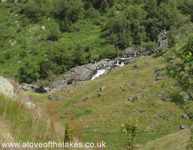 The path climbs above the waterfalls