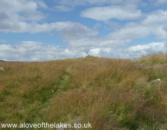 The summit cairn comes into view