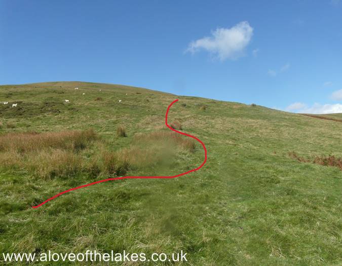 The path rises gently towards the summit