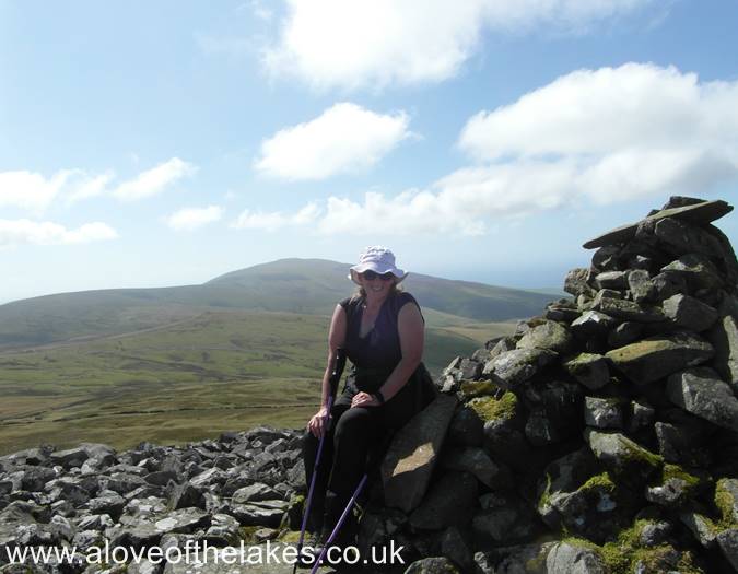 Sue on the summit of Kinmont Buck Barrow